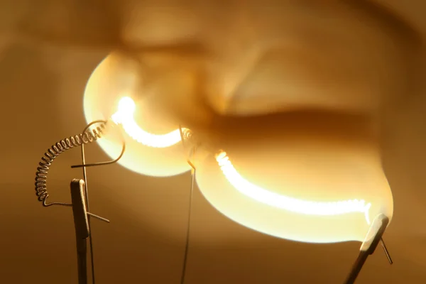 Close up glowing light bulb thread — Stock Photo, Image