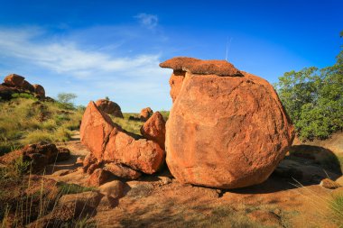 Granite eroded red rock formation, Devils Marbles, Australia clipart