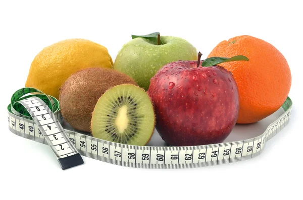 Group of fruits and measuring tape-concept — Stock Photo, Image