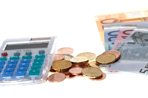 Moneta e calcolatrice in euro — Foto Stock