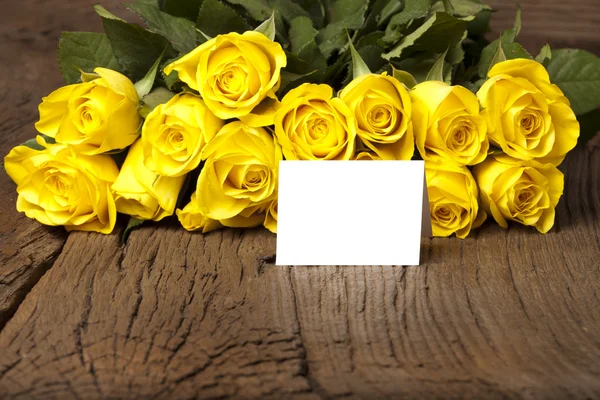 Bouquet of yellow with a card — Stock Photo, Image