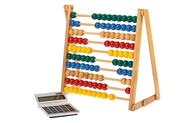 Abacus et une calculatrice de poche — Photo