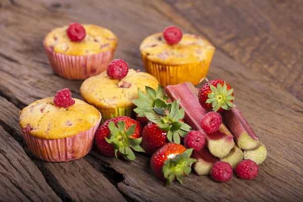 Fyra frukt muffins — Stockfoto