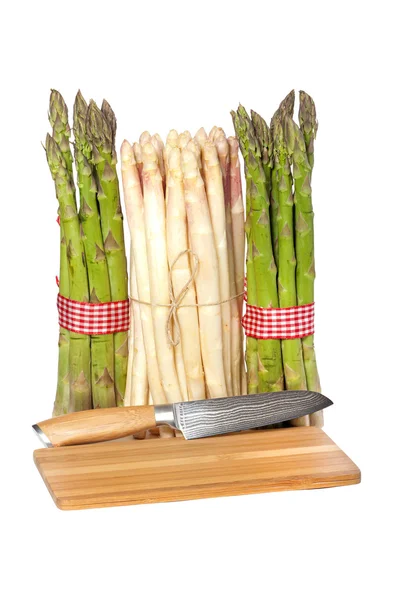 Asparagus and cutting board — Stock Photo, Image