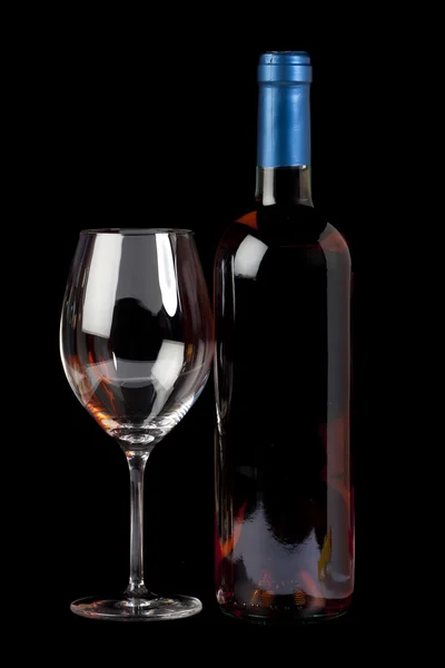 Bottle rose wine and a wineglass — Stock Photo, Image