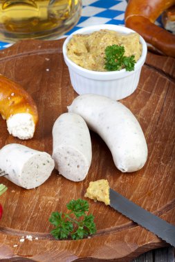 Bavarian veal sausage with mustard clipart