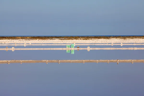 View over water surface of a salt basin — Stock Photo, Image