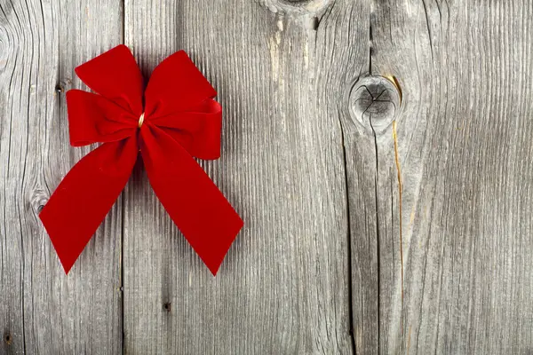 Christmas Greeting with a red Ribbon Bow — Stock Photo, Image