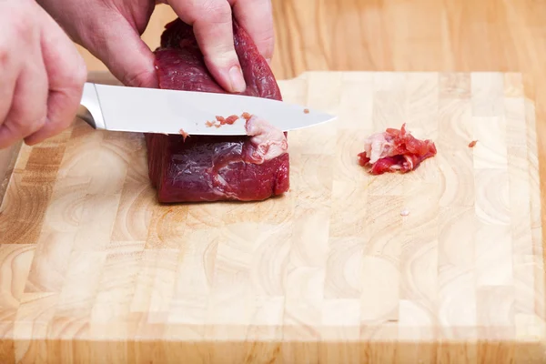 Fat cut off on a piece beef tenderloin — Stock Photo, Image