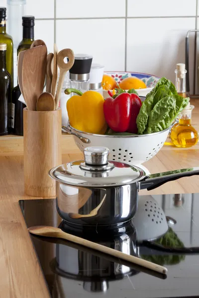 Cooking Pot and Cooking Spoon on Ceramic Hob — Stock Photo, Image