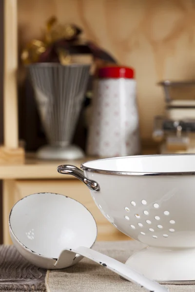 Ladle is next to a colander — Stock Photo, Image