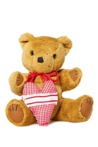 Pelúcia Teddy com coração de tecido — Fotografia de Stock