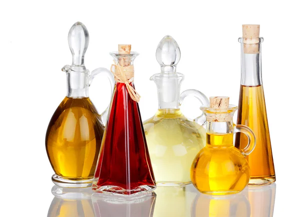 Various Cooking Oils in Glass carafes with real reflection — Stock Photo, Image