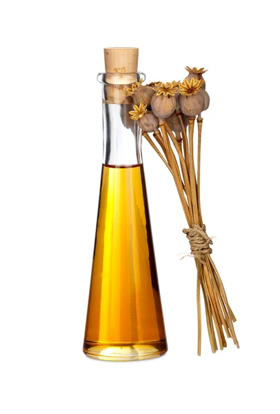 Botella de aceite de semilla de amapola y amapola seca —  Fotos de Stock