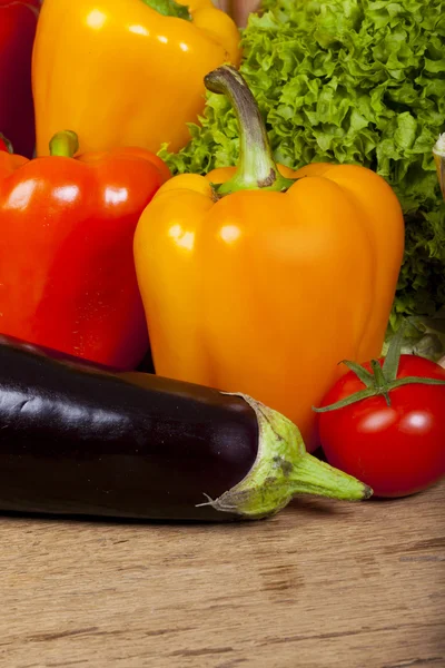 Bell peppers, eggplant and tomato — Stock Photo, Image