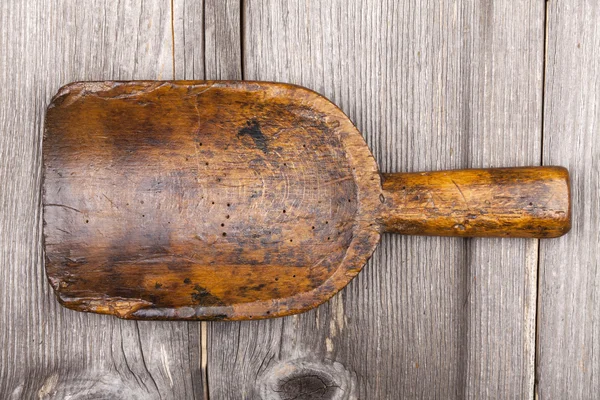 Very old antique wooden flour scoop — Stock Photo, Image