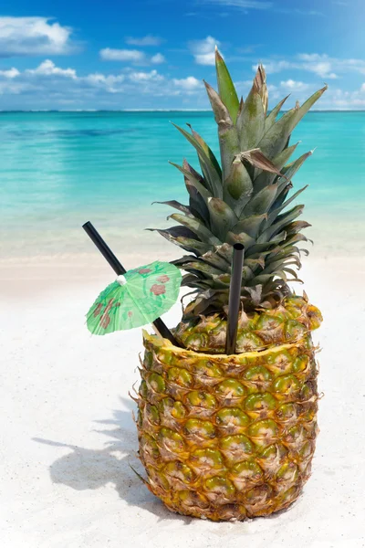 Tropical Pineapple drink in the sand — Stock Photo, Image