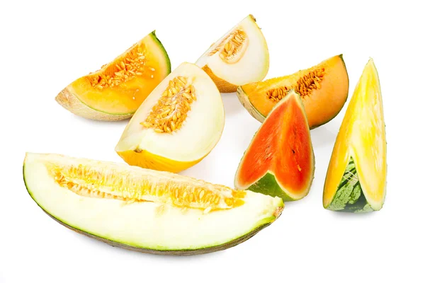 Diferentes variedades de melones en trozos — Foto de Stock