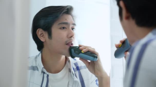 Health Concept Resolution Young Asian Man Shaving Bathroom Look Mirror — Stock Video