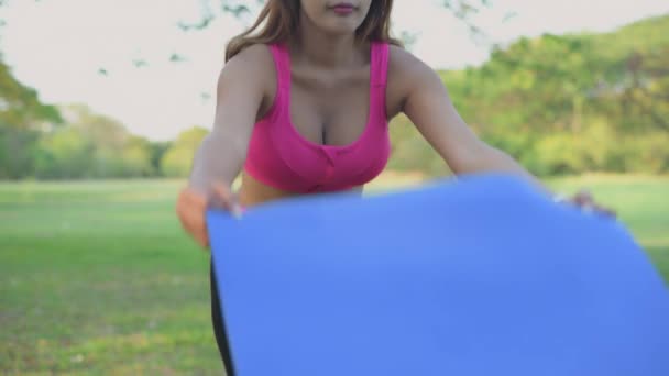 Exercise Concept Resolution Asian Woman Spreading Yoga Mat Garden — Stock Video