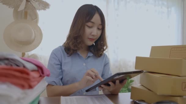 Business Concept Resolution Asian Woman Checking Goods Office Taking Notes — Stock Video