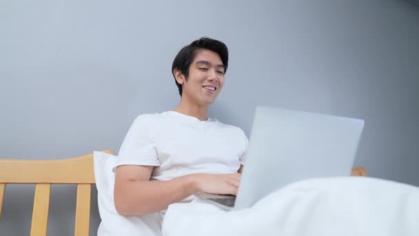 Holiday Concept Resolution Asian Man Using Computer Video Call Bedroom — Video Stock