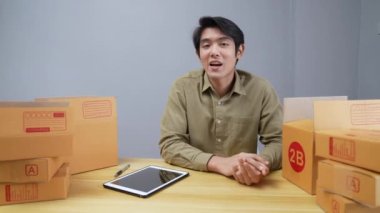 Business concept of 4k Resolution. Asian men are broadcasting online at home. communication technology.