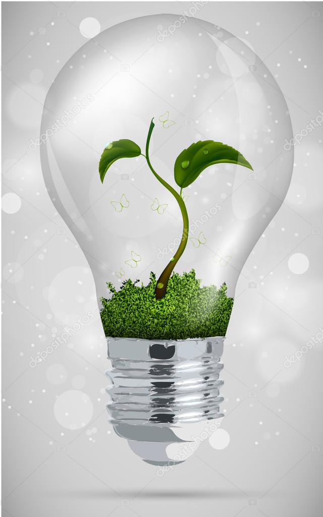 Green sprout in the bulb. the concept of clean energy