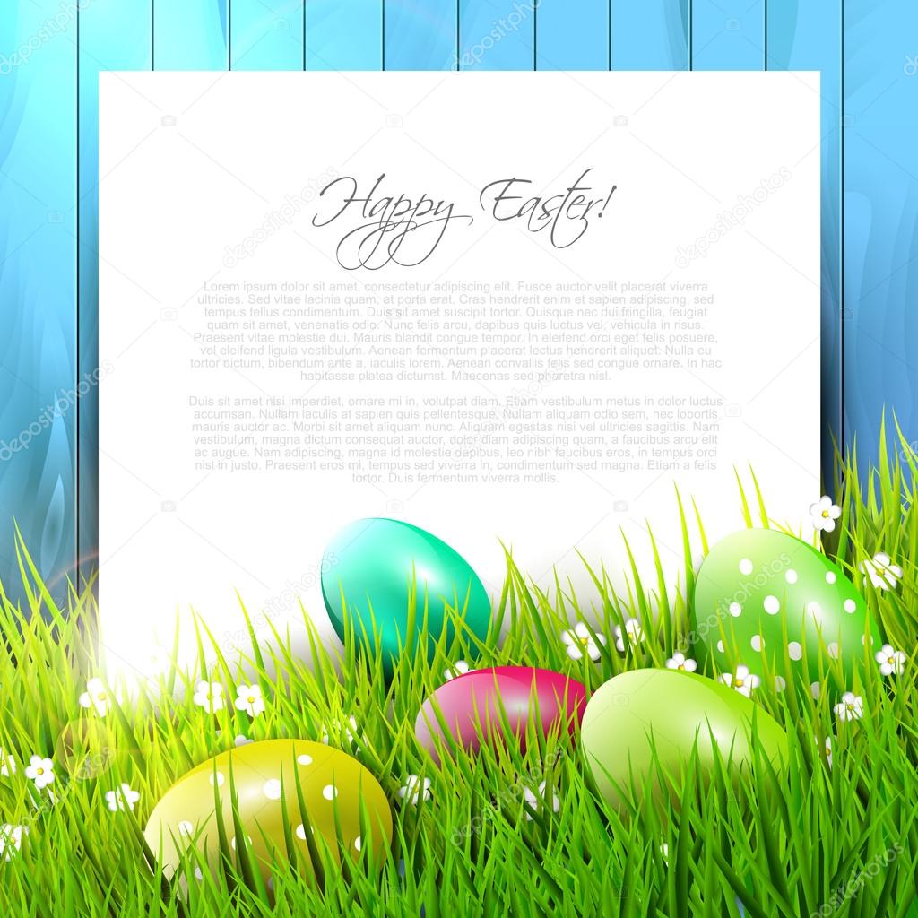 Easter background with colorful eggs in grass and empty paper
