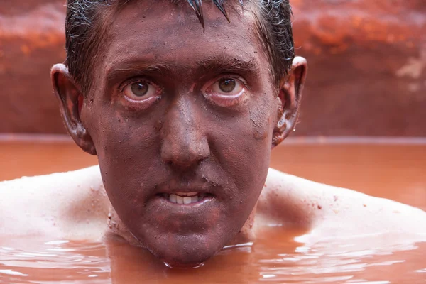 Man from the red mud — Stock Photo, Image