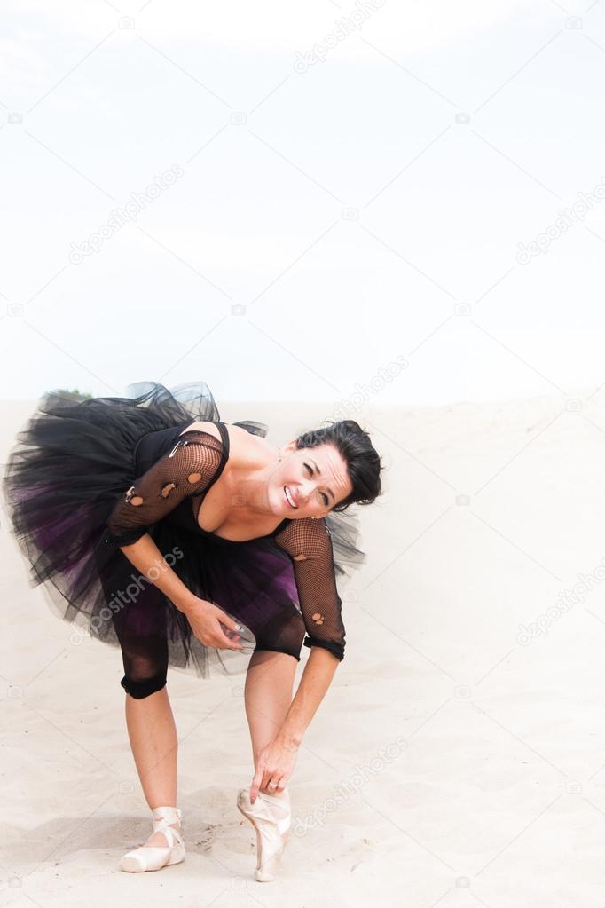 Ballerina bending and stretching
