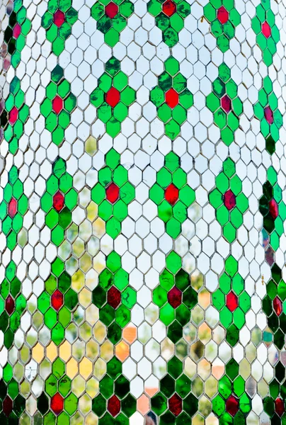 Closeup pattern decorate color glass on budish temple wall — Stock Photo, Image