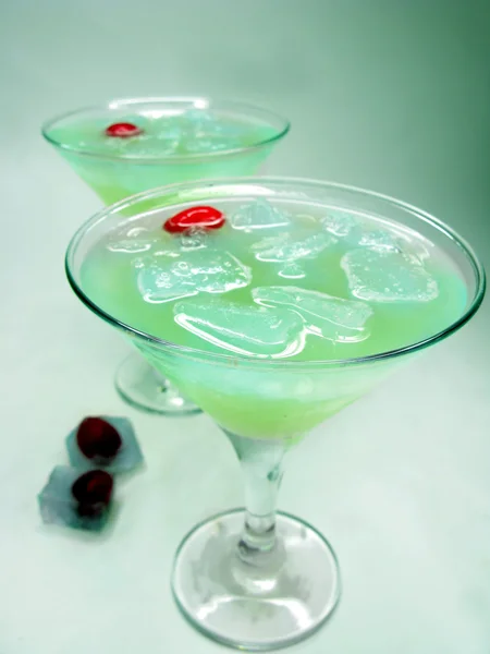 Alcohol blue lagoon cocktail drinks with mint — Stock Photo, Image