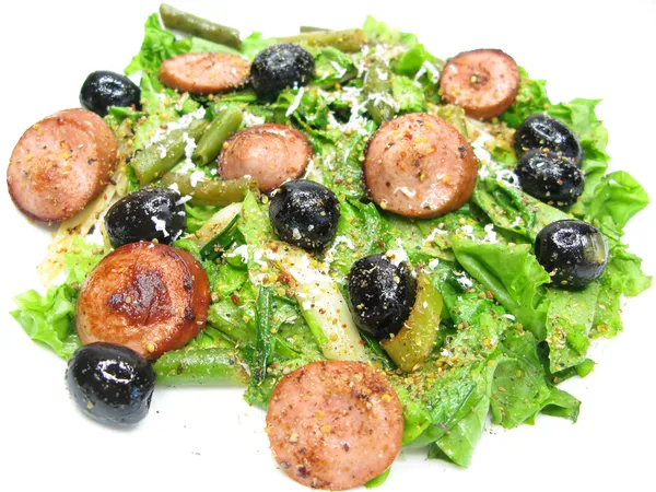 Greek hot salad with sausage and olives — Stock Photo, Image