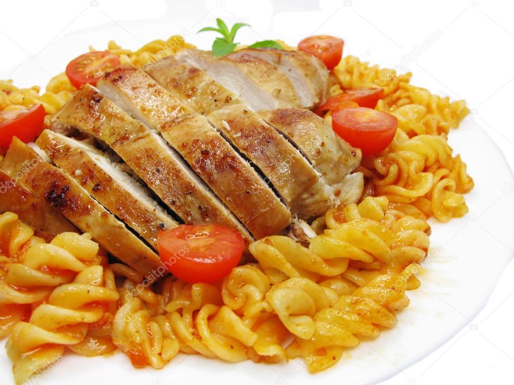 roast beef meat with vegetables and spaghetti