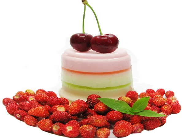 Jelly dessert with pudding and wild strawberry — Stock Photo, Image