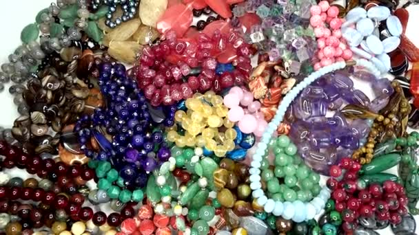Semigem necklaces and beads jewelery as fashion background — Stock Video