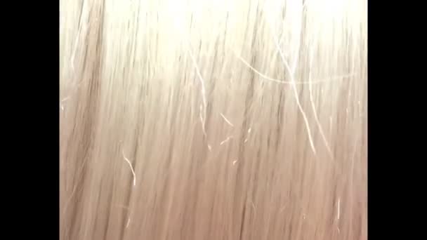 Destaque cabelo loiro textura fundo — Vídeo de Stock