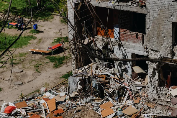 Damaged ruined and burnt out civilian house in ukrainian city Chernihiv near Kyiv on north of Ukraine. Ruins during War of Russia against Ukraine. Walls of ruined building by enemy aircraft troops — стокове фото