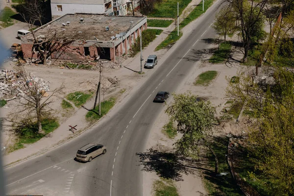 A pharmacy in the Ukrainian city of Chernihiv near Kyiv in northern Ukraine was damaged. Aerial photo. View through a broken window. Ruins during Russias war against Ukraine. — стокове фото