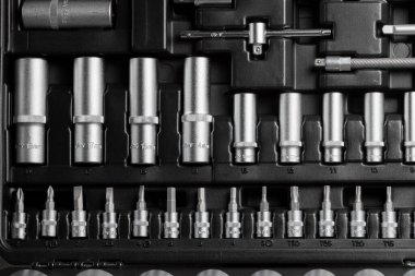 A large set of tools in a black box close-up. High quality photo