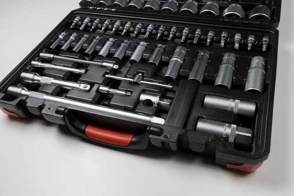  Auto mechanic hand tools set on white table. High quality photo
