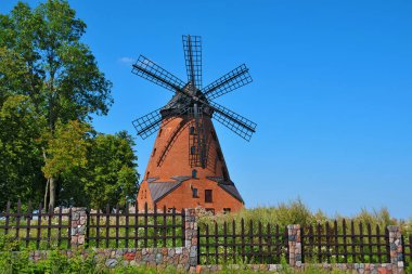 A brick Dutch windmill from the 19th century in Stara Rozanka, Warmian-Masurian Voivodeship, Poland