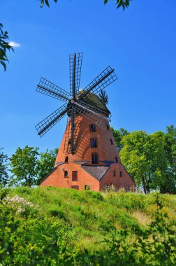A brick Dutch windmill from the 19th century in Stara Rozanka, Warmian-Masurian Voivodeship, Poland