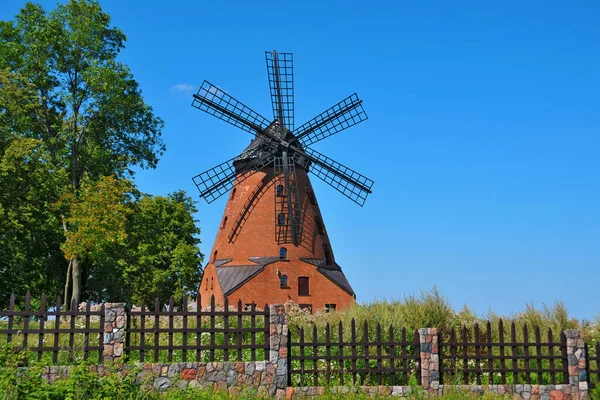 A brick Dutch windmill from the 19th century in Stara Rozanka, Warmian-Masurian Voivodeship, Poland