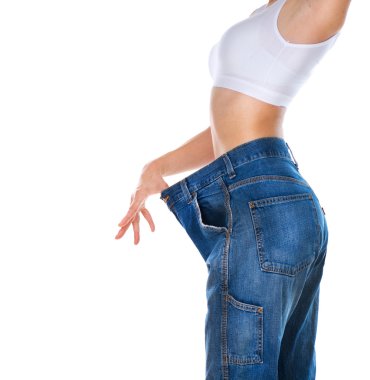 Weight Loss Woman isolated on a white background. Slim Body