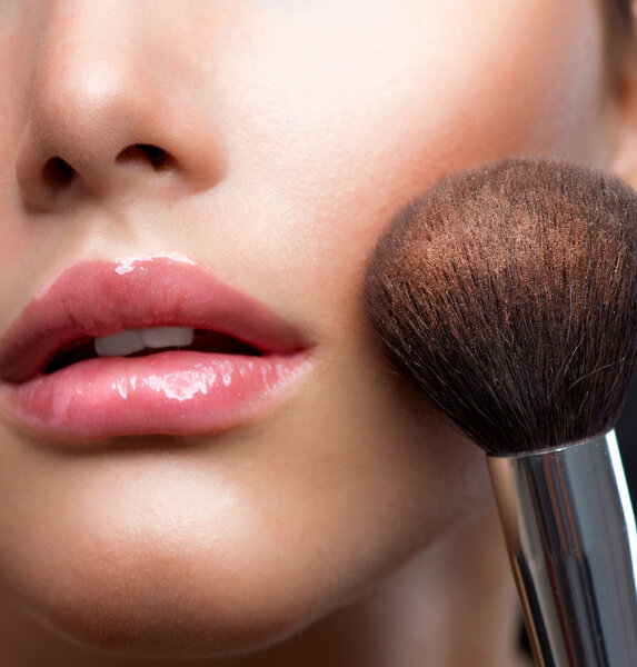 Make-up closeup. Cosmetic Powder Brush. Perfect Skin