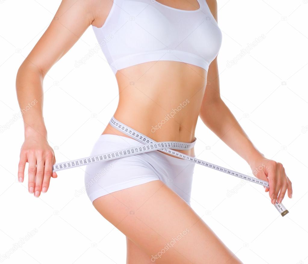 Woman measuring her waistline. Perfect Slim Body