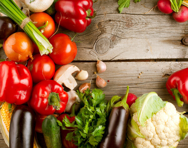 Healthy Organic Vegetables on the Wooden Background