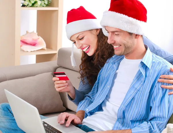 http://st.depositphotos.com/1491329/1413/i/450/depositphotos_14134463-Young-couple-with-laptop-and-credit-card-buying-online.jpg